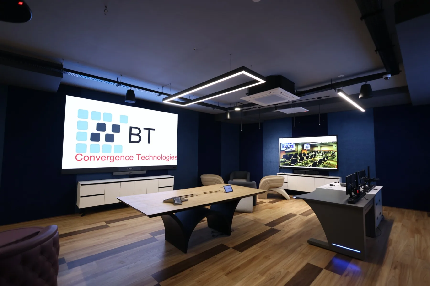 BT Convergence Technologies boardroom with dual-display conferencing